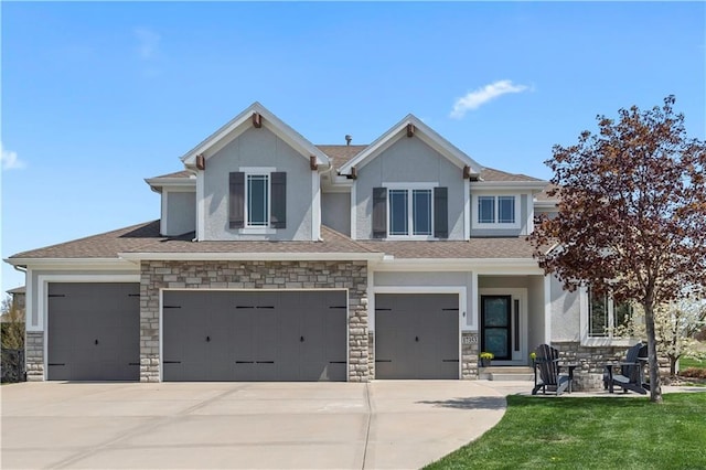 view of front of house featuring concrete driveway, stucco siding, a garage, and stone siding