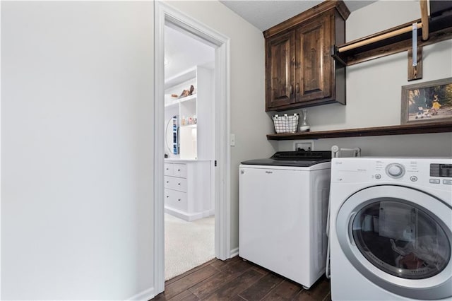 laundry area with washer and dryer, cabinet space, and dark wood-style floors