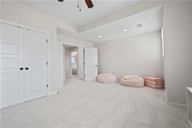 unfurnished bedroom with carpet, baseboards, recessed lighting, a closet, and ceiling fan