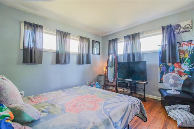 25388 Chieftain Rd, Lawrence, KS 66044 - bedroom with baseboards and wood finished floors