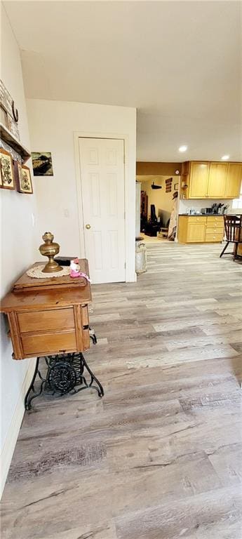 1463 Missouri Rd, Iola, KS 66749 - hallway featuring light wood-style floors and baseboards