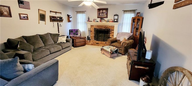 1463 Missouri Rd, Iola, KS 66749 - carpeted living area with ceiling fan and a fireplace