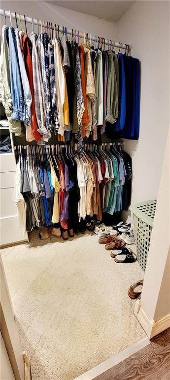 1463 Missouri Rd, Iola, KS 66749 - spacious closet featuring wood finished floors