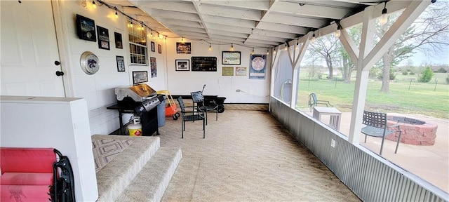 1463 Missouri Rd, Iola, KS 66749 - sunroom featuring a fire pit and lofted ceiling