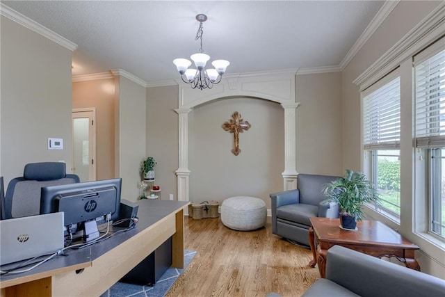 4102 NW 76th Ter, Kansas City, MO 64151 - home office with light wood-style floors, a chandelier, ornate columns, and ornamental molding