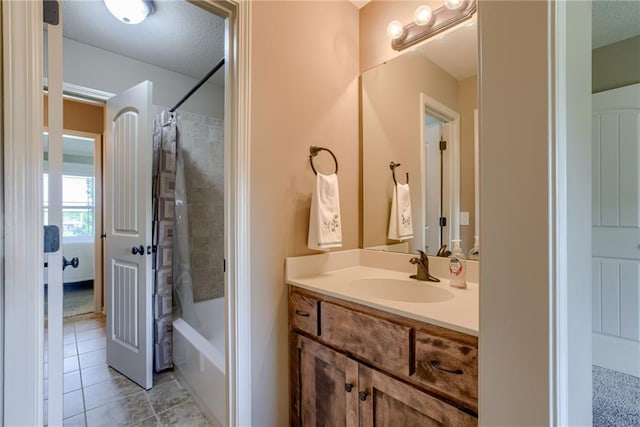 4102 NW 76th Ter, Kansas City, MO 64151 - full bathroom with vanity, tile patterned flooring, and shower / tub combo