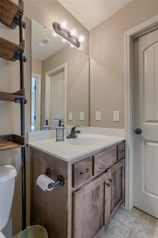 4102 NW 76th Ter, Kansas City, MO 64151 - bathroom featuring vanity and toilet