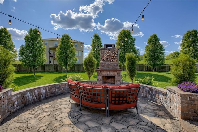 4102 NW 76th Ter, Kansas City, MO 64151 - view of patio / terrace featuring an outdoor living space with a fireplace