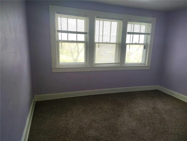 10816 E 27th St, Independence, MO 64052 - carpeted empty room with baseboards