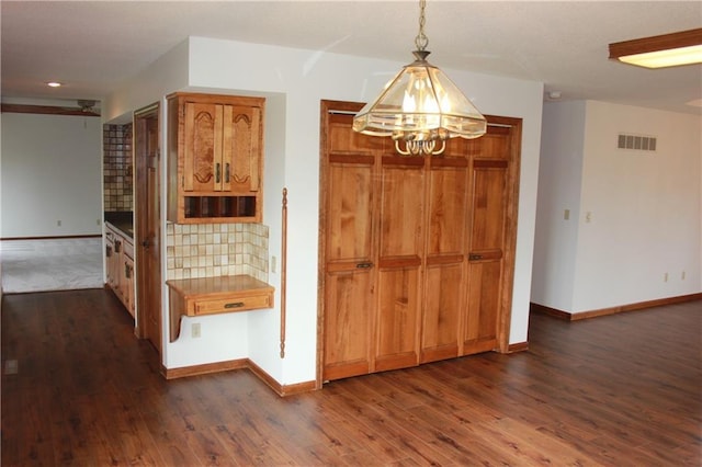 1410 Grandview Dr, Warrensburg, MO 64093 - mudroom featuring baseboards, dark wood finished floors, a chandelier, and recessed lighting