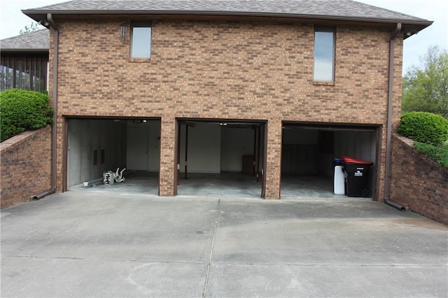 1410 Grandview Dr, Warrensburg, MO 64093 - garage with concrete driveway