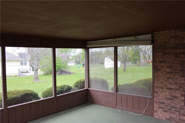 1410 Grandview Dr, Warrensburg, MO 64093 - unfurnished sunroom with healthy amount of natural light