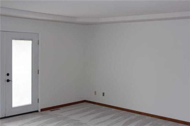 1410 Grandview Dr, Warrensburg, MO 64093 - unfurnished room with light colored carpet and baseboards