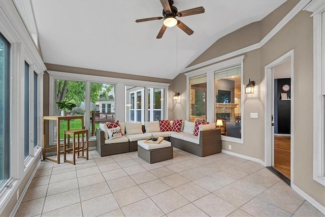 sunroom / solarium featuring vaulted ceiling