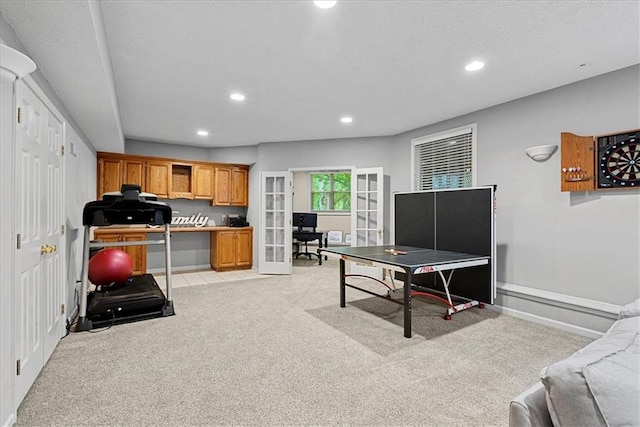 playroom with light carpet, french doors, recessed lighting, an office area, and baseboards