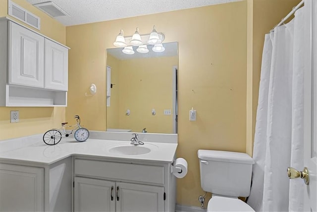 full bath featuring toilet and vanity
