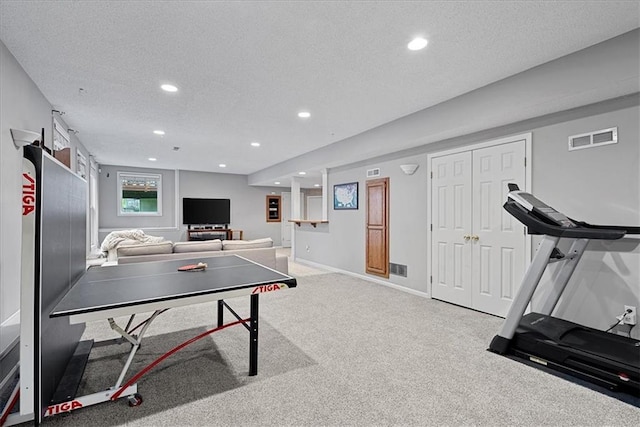 14124 Flint St, Overland Park, KS 66221 - playroom featuring a textured ceiling, carpet floors, and recessed lighting