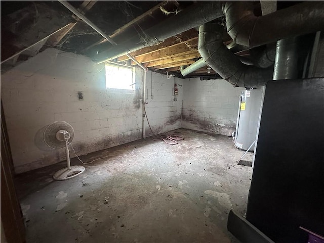 218 S Kent St, Excelsior Springs, MO 64024 - basement with water heater