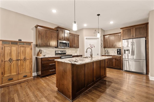 19625 E 18th Ter, Independence, MO 64057 - kitchen with appliances with stainless steel finishes, a sink, dark wood finished floors, decorative backsplash, and recessed lighting