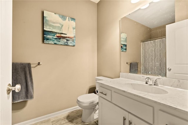 19625 E 18th Ter, Independence, MO 64057 - full bathroom featuring vanity, toilet, baseboards, and curtained shower