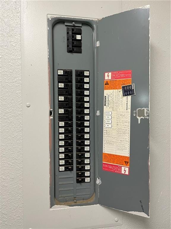 utility room with electric panel