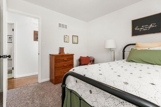 416 NE Carriage St, Lees Summit, MO 64064 - carpeted bedroom with baseboards