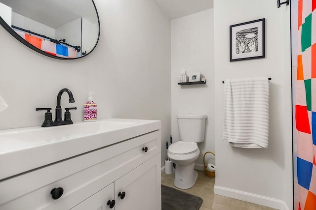 416 NE Carriage St, Lees Summit, MO 64064 - bathroom with vanity, toilet, tile patterned flooring, baseboards, and a shower with curtain