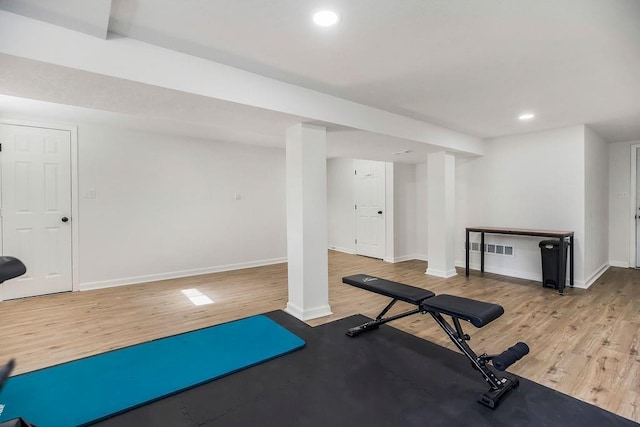 416 NE Carriage St, Lees Summit, MO 64064 - exercise room with wood finished floors, baseboards, and recessed lighting