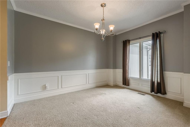 7428 N Smalley Ave, Kansas City, MO 64158 - empty room with ornamental molding, wainscoting, a chandelier, a textured ceiling, and a decorative wall