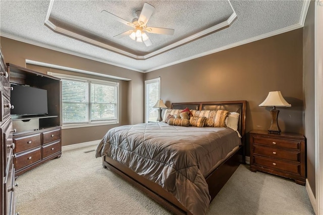 7428 N Smalley Ave, Kansas City, MO 64158 - bedroom with a textured ceiling, carpet flooring, crown molding, a raised ceiling, and baseboards