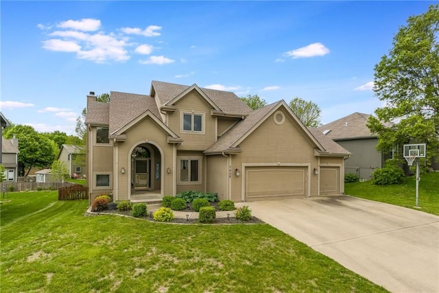 7428 N Smalley Ave, Kansas City, MO 64158 - traditional-style home with a chimney, concrete driveway, an attached garage, and a shingled roof
