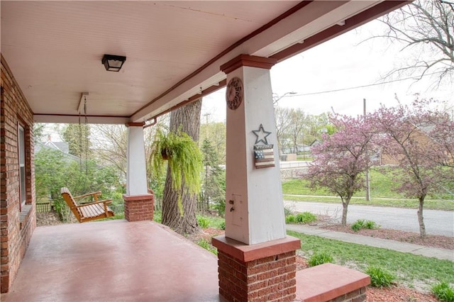 view of patio featuring a porch
