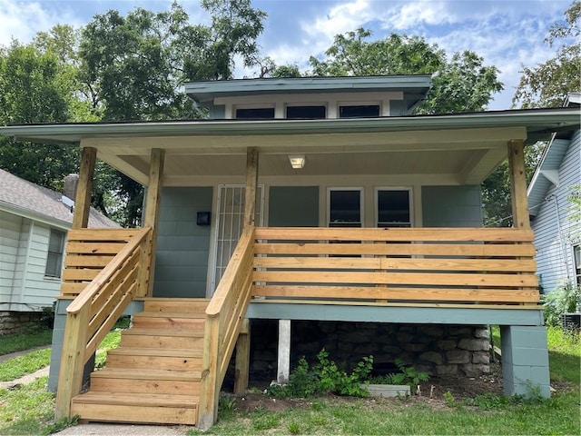 5702 Euclid Ave, Kansas City, MO 64130 - exterior space featuring a porch