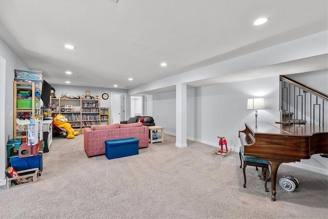 living room featuring baseboards, carpet flooring, and recessed lighting