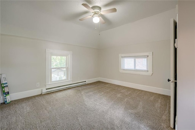 empty room with a baseboard radiator, plenty of natural light, carpet flooring, and ceiling fan