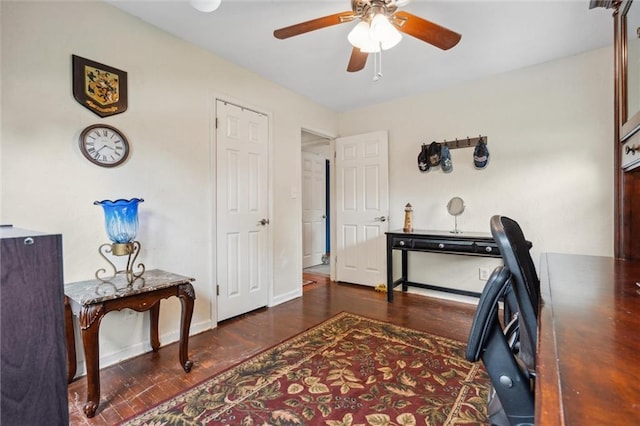 13613 Lowell Ave, Grandview, MO 64030 - office space featuring ceiling fan, wood finished floors, and baseboards
