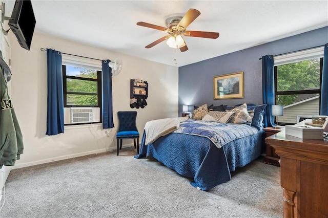 13613 Lowell Ave, Grandview, MO 64030 - carpeted bedroom featuring cooling unit, baseboards, and ceiling fan