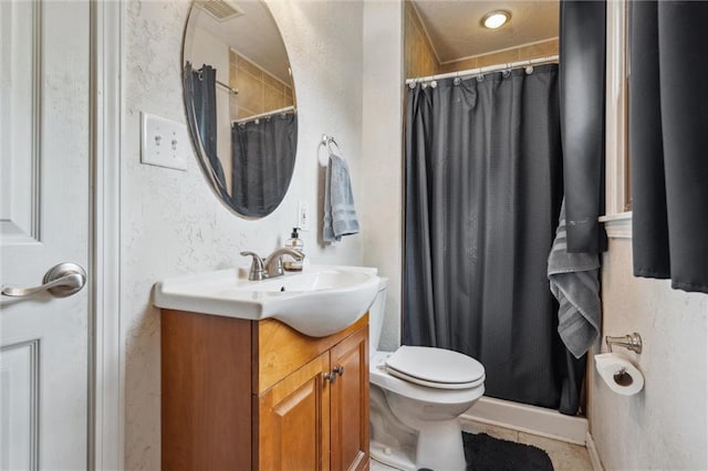 13613 Lowell Ave, Grandview, MO 64030 - bathroom with vanity, curtained shower, toilet, tile patterned flooring, and a textured wall