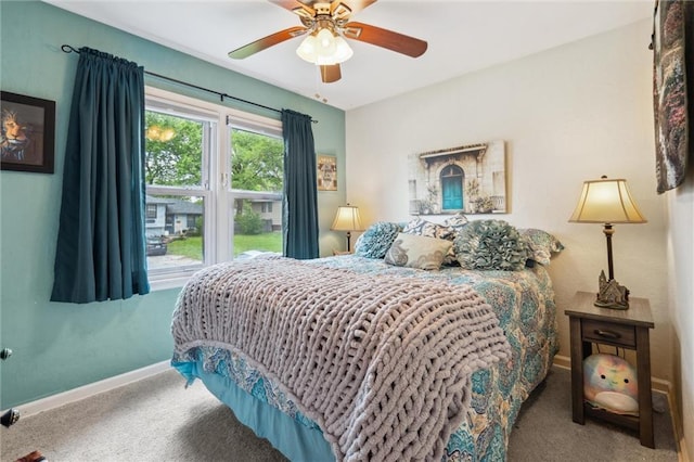 13613 Lowell Ave, Grandview, MO 64030 - bedroom with carpet flooring, baseboards, and a ceiling fan