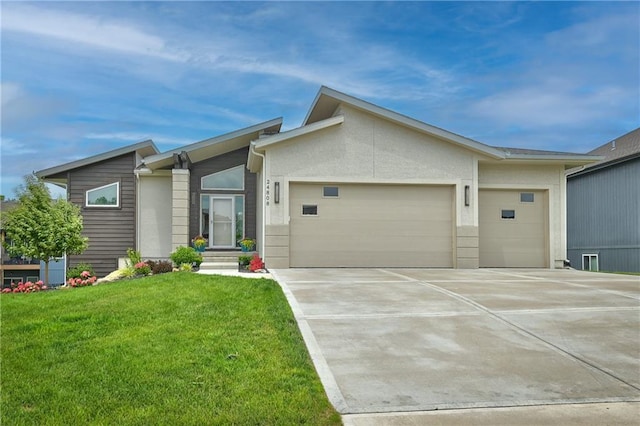 view of front facade with a garage, concrete driveway, and a front lawn