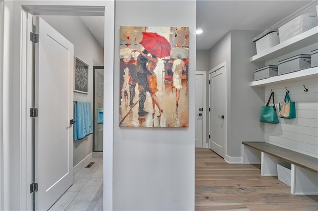 mudroom with baseboards, recessed lighting, wood finished floors, and visible vents