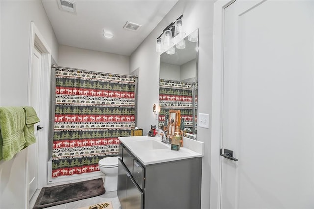 full bathroom with visible vents, tile patterned floors, toilet, and vanity