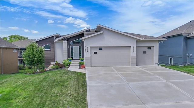 24808 W 88th Ter, Lenexa, KS 66227 - view of front of home featuring an attached garage, concrete driveway, a front lawn, and stucco siding
