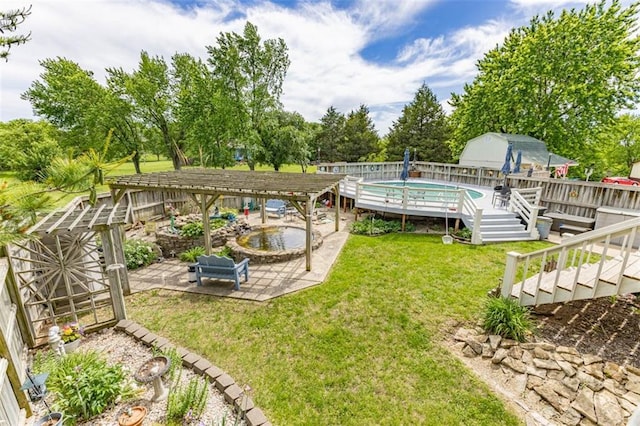 24545 W 54th St, Shawnee, KS 66226 - view of yard featuring a wooden deck, a patio area, view of scattered trees, a pergola, and stairway