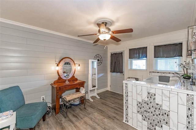 24545 W 54th St, Shawnee, KS 66226 - living area featuring crown molding, a ceiling fan, and wood finished floors