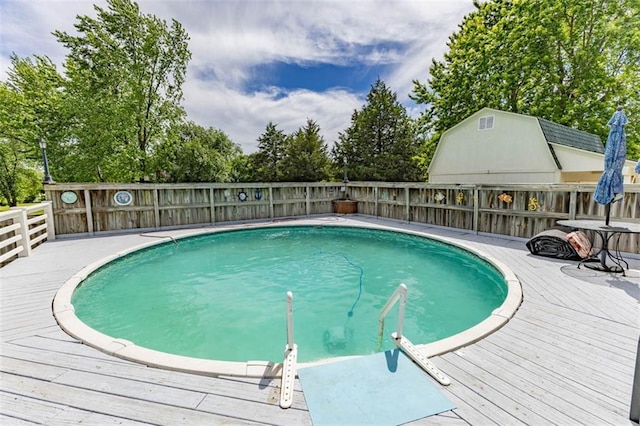 24545 W 54th St, Shawnee, KS 66226 - view of swimming pool featuring a deck and a fenced backyard