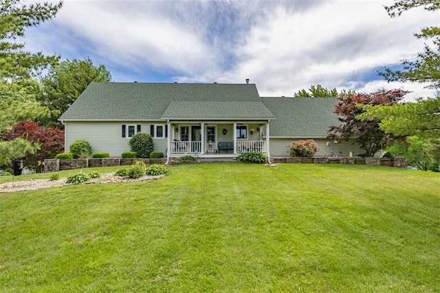 24545 W 54th St, Shawnee, KS 66226 - rear view of house with a porch, a lawn, and roof with shingles