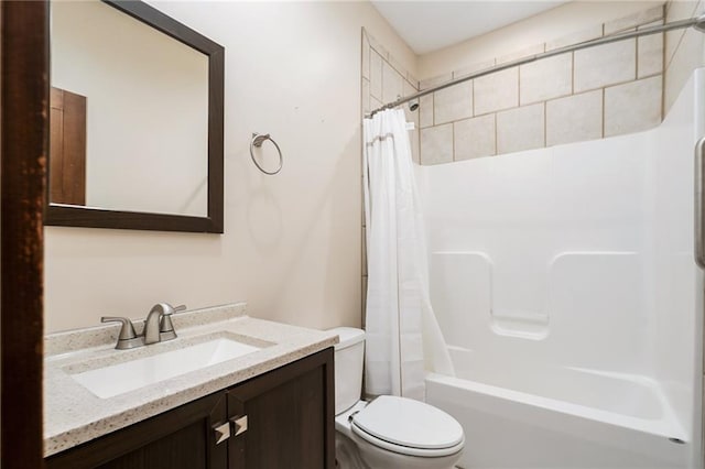 bathroom with shower / tub combo, vanity, and toilet