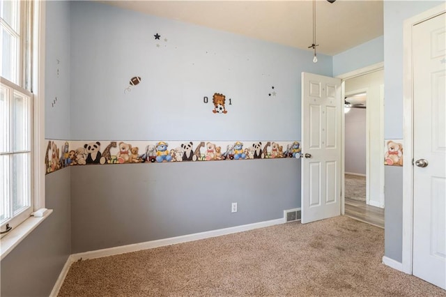 5431 Switzer Rd, Merriam, KS 66203 - unfurnished bedroom with carpet floors and baseboards