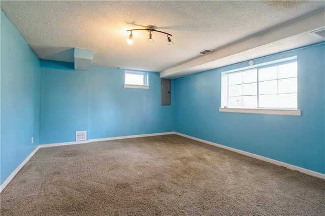 5431 Switzer Rd, Merriam, KS 66203 - below grade area featuring carpet floors, a textured ceiling, and electric panel